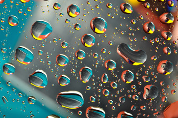 Water drops on multicolor background. Selective focus.