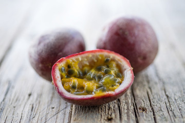 fresh ripe passion fruit on a wooden background