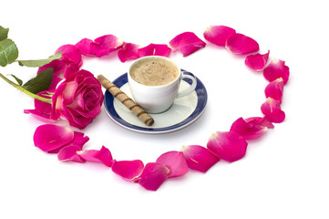 cup of coffee petals of roses and scarlet rose