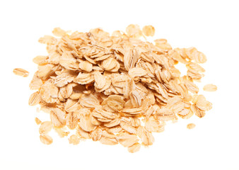 Pile of raw organic oatmeal flakes