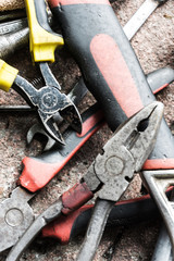closeup view of work tools on brick ground