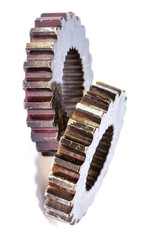 Closeup of steel gears meshing together