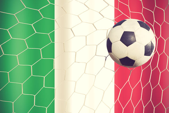 Italy waving flag and soccer ball in goal net vintage color