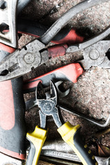 closeup view of work tools on brick ground