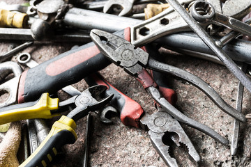 closeup view of work tools on brick ground