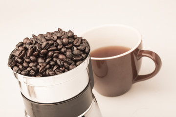 Coffee beans in coffe grinder
