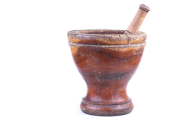 wooden mortar and pestle isolated on white background