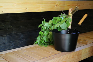 Traditional sauna and whisk called "vihta" made of birch in Finland