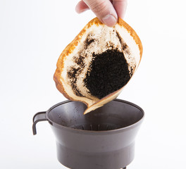 Black coffee and coffee filters, coffee with white background.