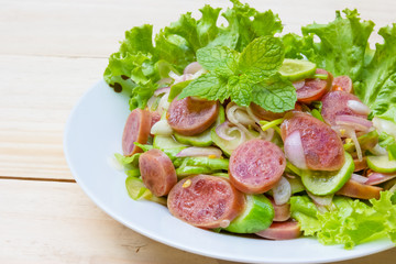 Chinese Sausage Salad on wood background