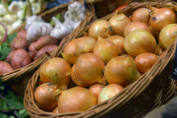 Onions on display in a supermarket