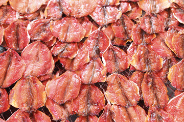 Natural drying of salted fish.