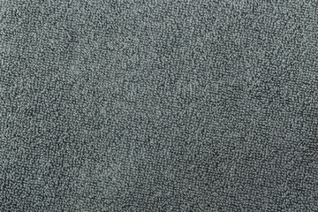 Fototapeta na wymiar A fine texture of soft gray cotton bath towel
