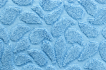 Texture of oval shape light blue cotton bath towel