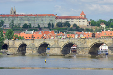 Obraz premium View of colorful old town and Prague castle with river Vltava, Czech Republic