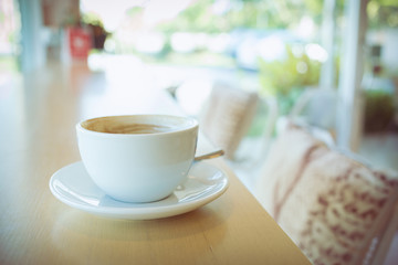 hot of coffee drink on wooden table bar in the cafe