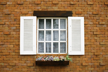 wood window with brick block
