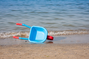 wheelbarrow carries water from the sea