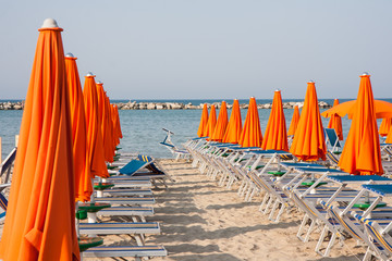 Umbrellas and sunbeds in Rimini and Riccione and Cattolica Beach