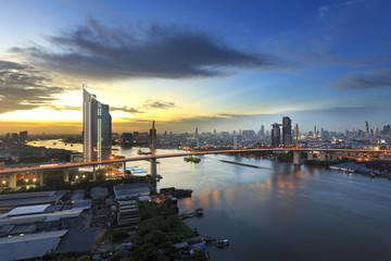 Bangkok office building riverside at sunset, before Night Falls