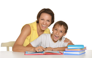 Fototapeta premium Mother and son doing homework