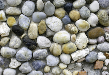background made of a wall with pebbles
