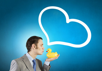 Businessman with duck