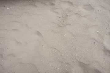 closeup of sand pattern of a beach