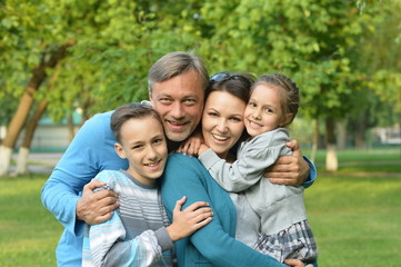 Fototapeta premium Family resting in summer park