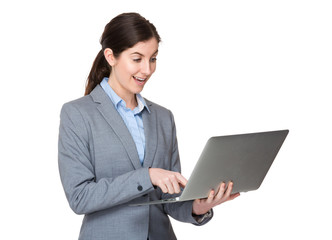 Brunette businesswoman use of the laptop computer