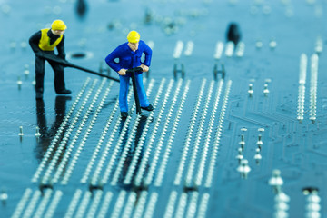 Team of engineers repairing circuit mother board. Computer repai