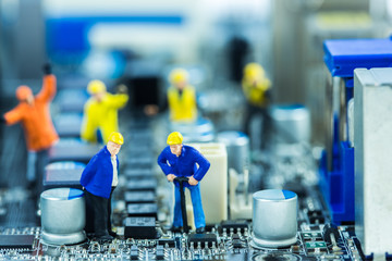 Team of engineers repairing circuit mother board. Computer repai