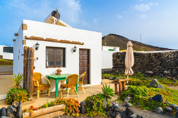 Fototapeta na wymiar Typical Canarian house for tourists on El Golfo beach, Lanzarote, Canary Islands, Spain