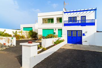 Typical houses in Canarian village of El Golfo on coast of Lanzarote island, Spain © pkazmierczak