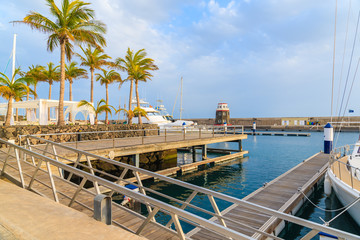 Fototapeta na wymiar Modern marina in Puerto Calero built in Caribbean style, Lanzarote, Canary Islands, Spain