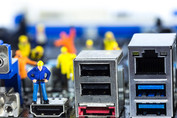 Team of engineers repairing circuit mother board. Computer repai