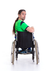 Obraz premium young man in a wheelchairfrom the back