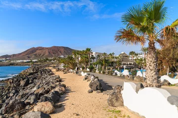Poster Coastal promenade in Playa Blanca holiday resort, Canary Islands, Spain © pkazmierczak