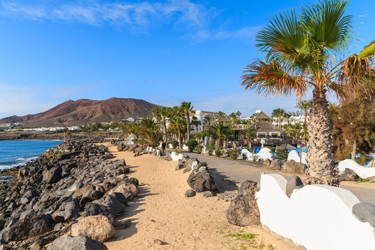 Coastal promenade in Playa Blanca holiday resort, Canary Islands, Spain