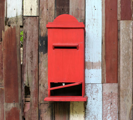old red mail box on the wood background