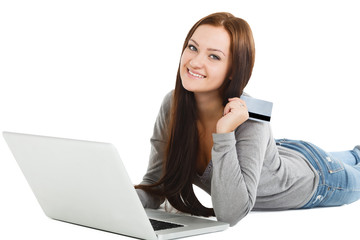 Naklejka premium Online Shopping. Happy Smiling Woman Using Credit Card to Intern