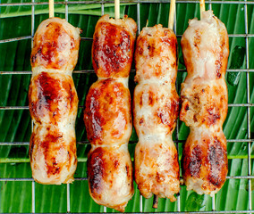 Hot Dogs on Grill with Flames