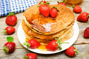 pancakes with fresh berries and honey