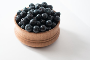 blueberries in a wooden bowl