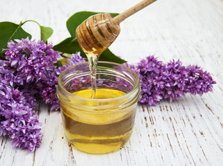 Lilac flowers with honey