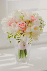 Beautiful wedding bouquet of tulips and roses