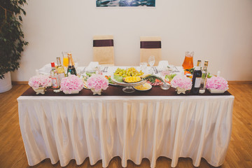 Table set for bride and groom. decorated wedding table