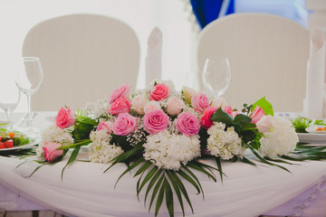 Gorgeous flowers on table in wedding day