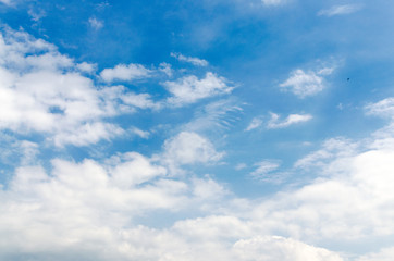 Blank sky surface with small clouds