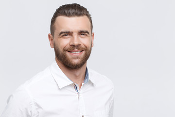 Close-up of smiling man on isolated background 